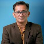 Dr. MAULESH DHOLAKIA
