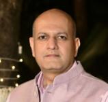 Dr. ARJUN