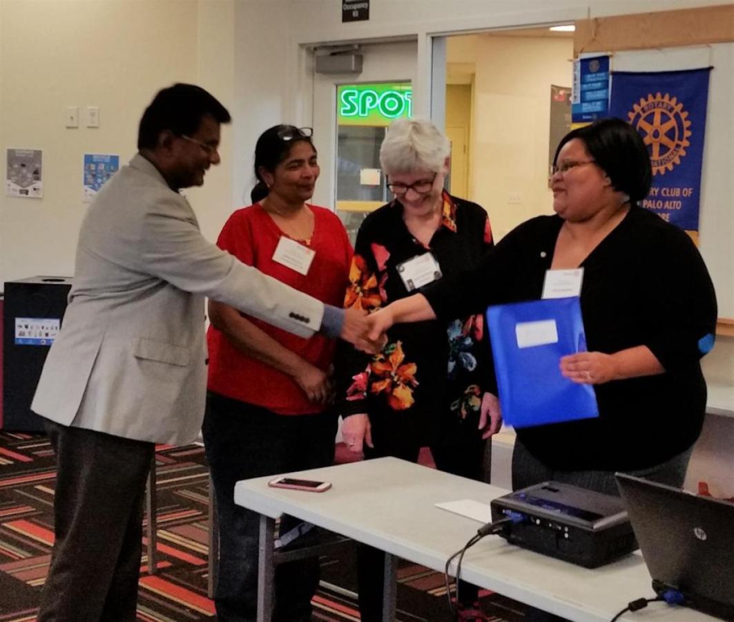 Welcoming a New MemberTwo clubs induct a new Rotarian.Club AIntroduces the new member.Assi... - image 3