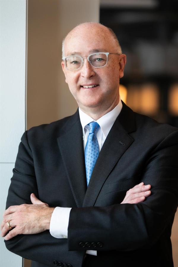 Who serves as Rotary International's General Secretary and CEO? - image 3